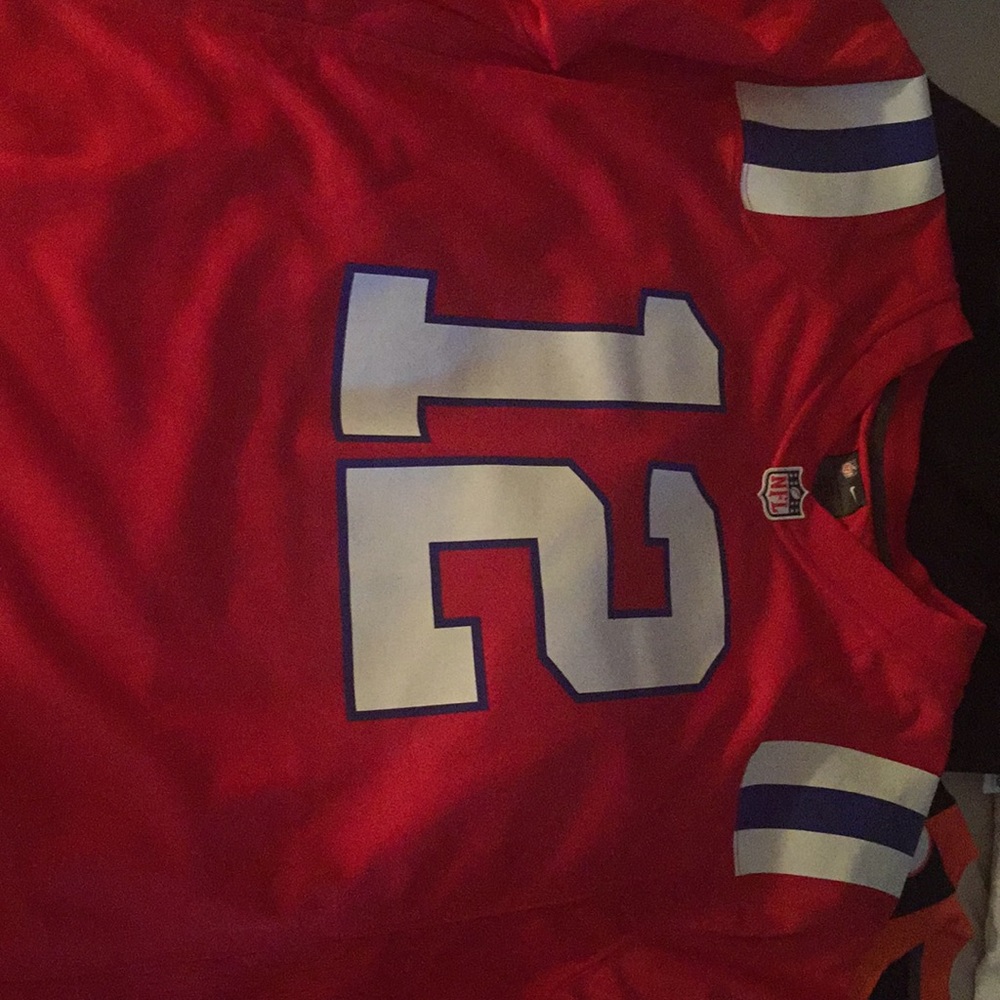 Tom Brady read and blue football jersey